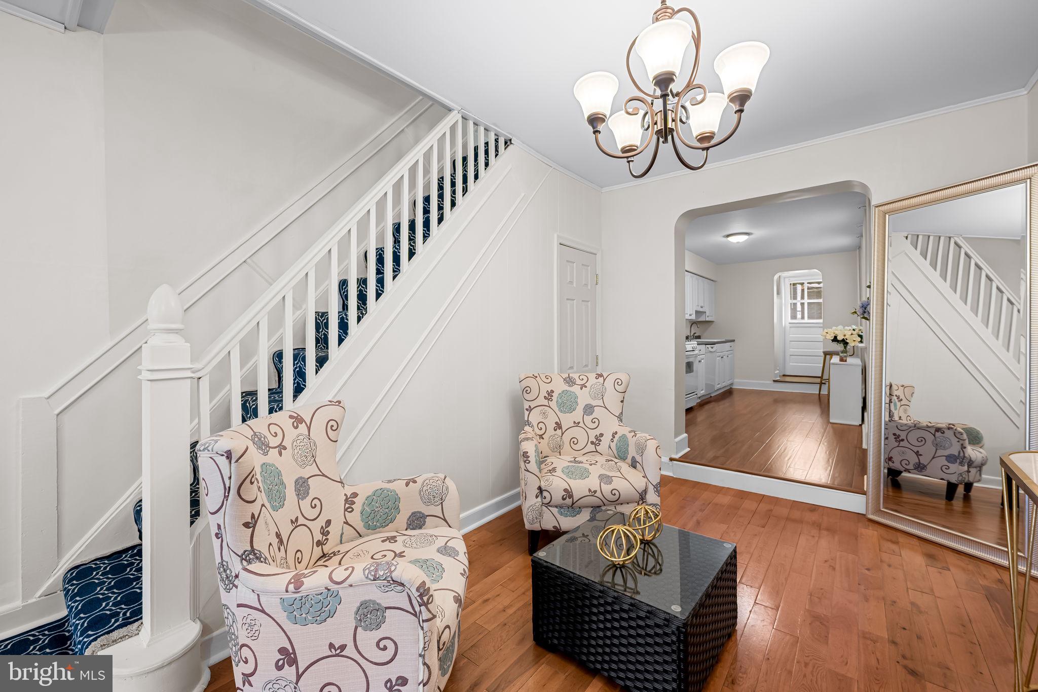 417 South Madeira Street Baltimore, MD 21231 - Photo 12 of 33 a living room with furniture chandelier and a chandelier