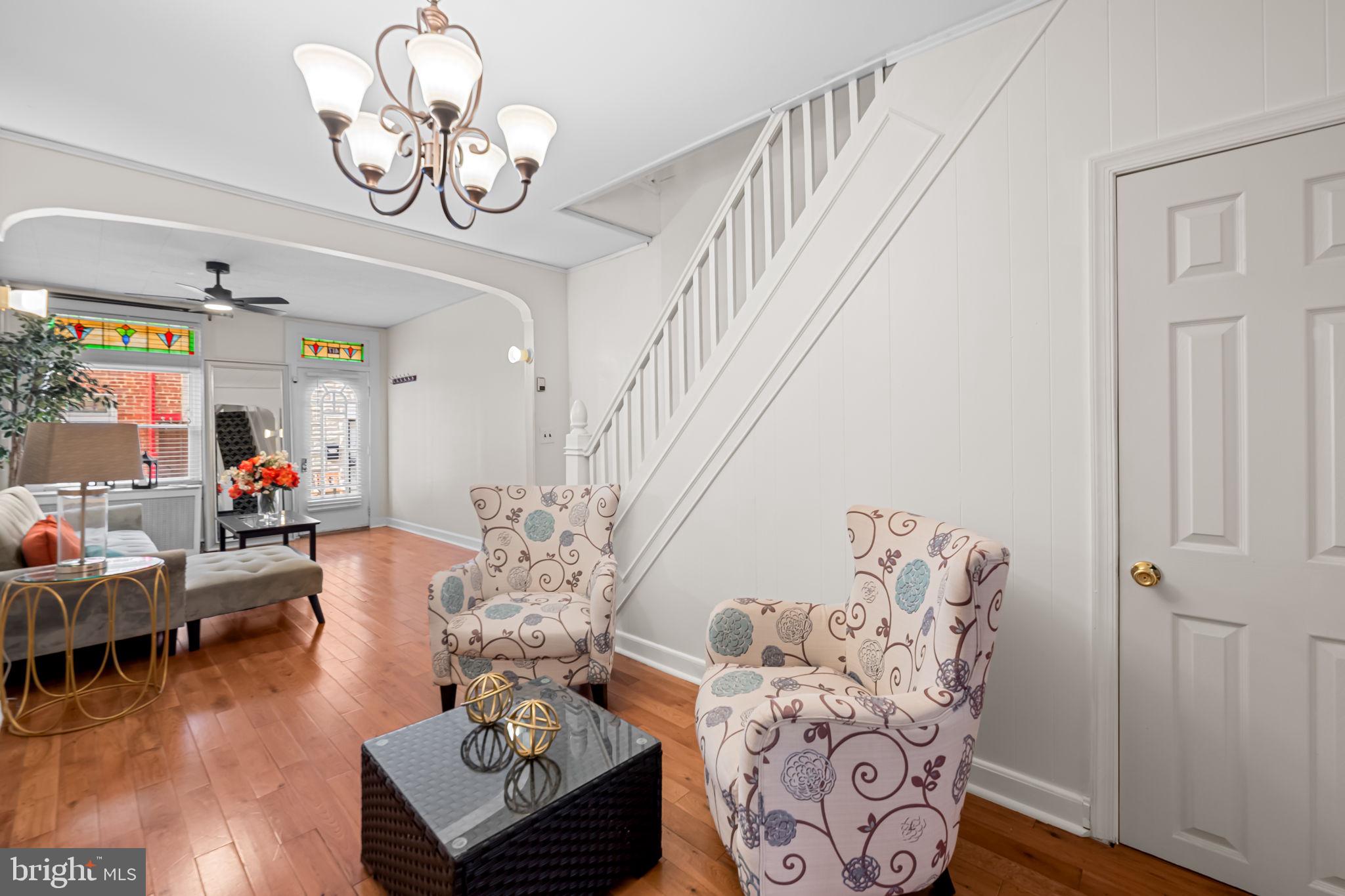 417 South Madeira Street Baltimore, MD 21231 - Photo 3 of 33 a living room with furniture and wooden floor