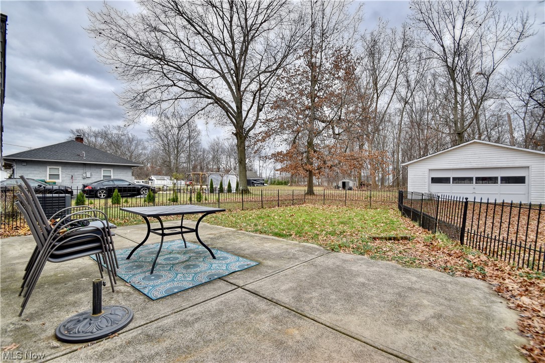 8044 Bellflower Road Mentor, OH 44060 - Photo 28 of 33 View of patio with a garage