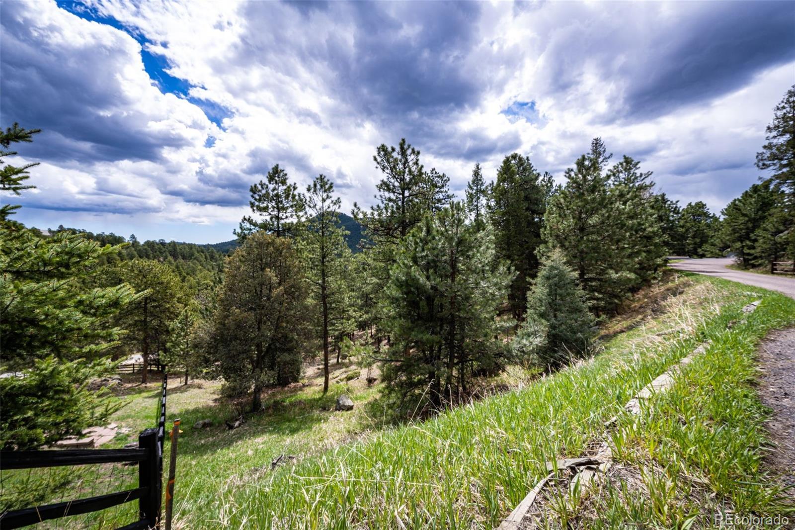 4094 Alpine Drive Evergreen, CO 80439 - Photo 3 of 39 a view of a lake