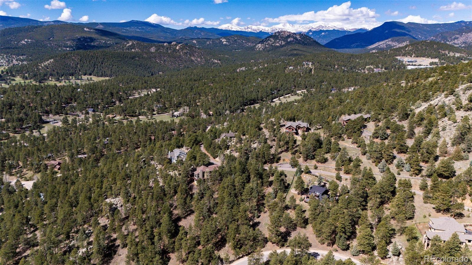 4094 Alpine Drive Evergreen, CO 80439 - Photo 32 of 39 a view of an outdoor space and a yard