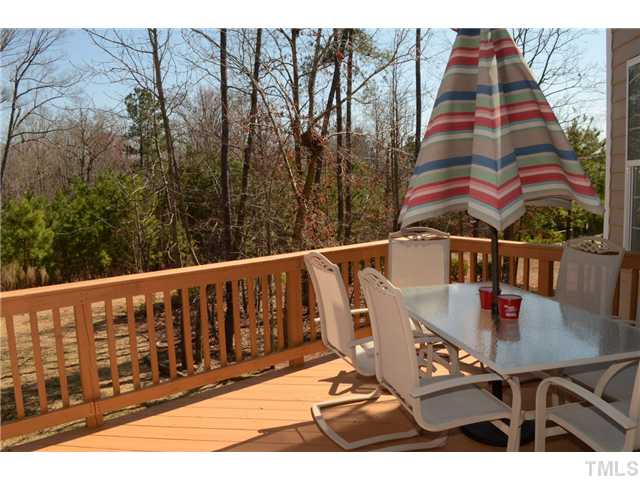 4457 Fairview Ridge Lane Apex, NC 27539 - Photo 19 of 25 Park-like view from the back deck is cherished year round.