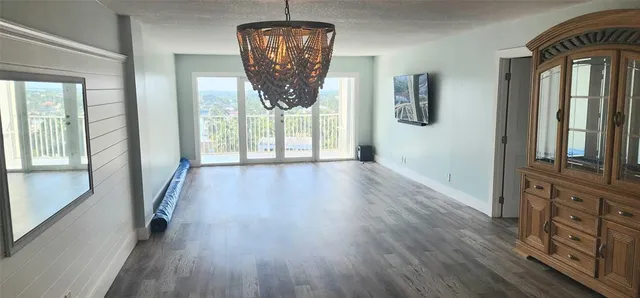 a view of a room that has a large window