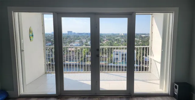 a view of balcony with wooden floor