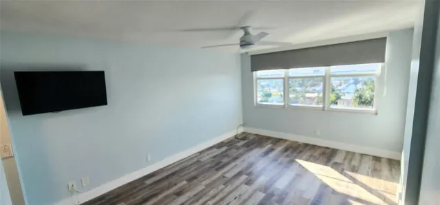 a bathroom with a toilet sink and vanity