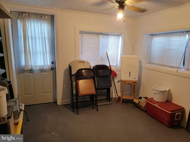 a room with furniture and windows