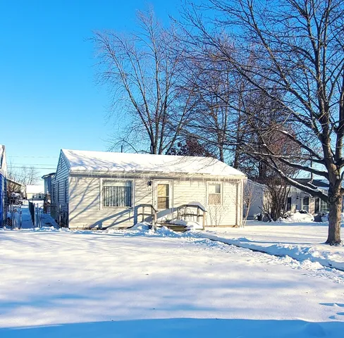 a front view of a building with street