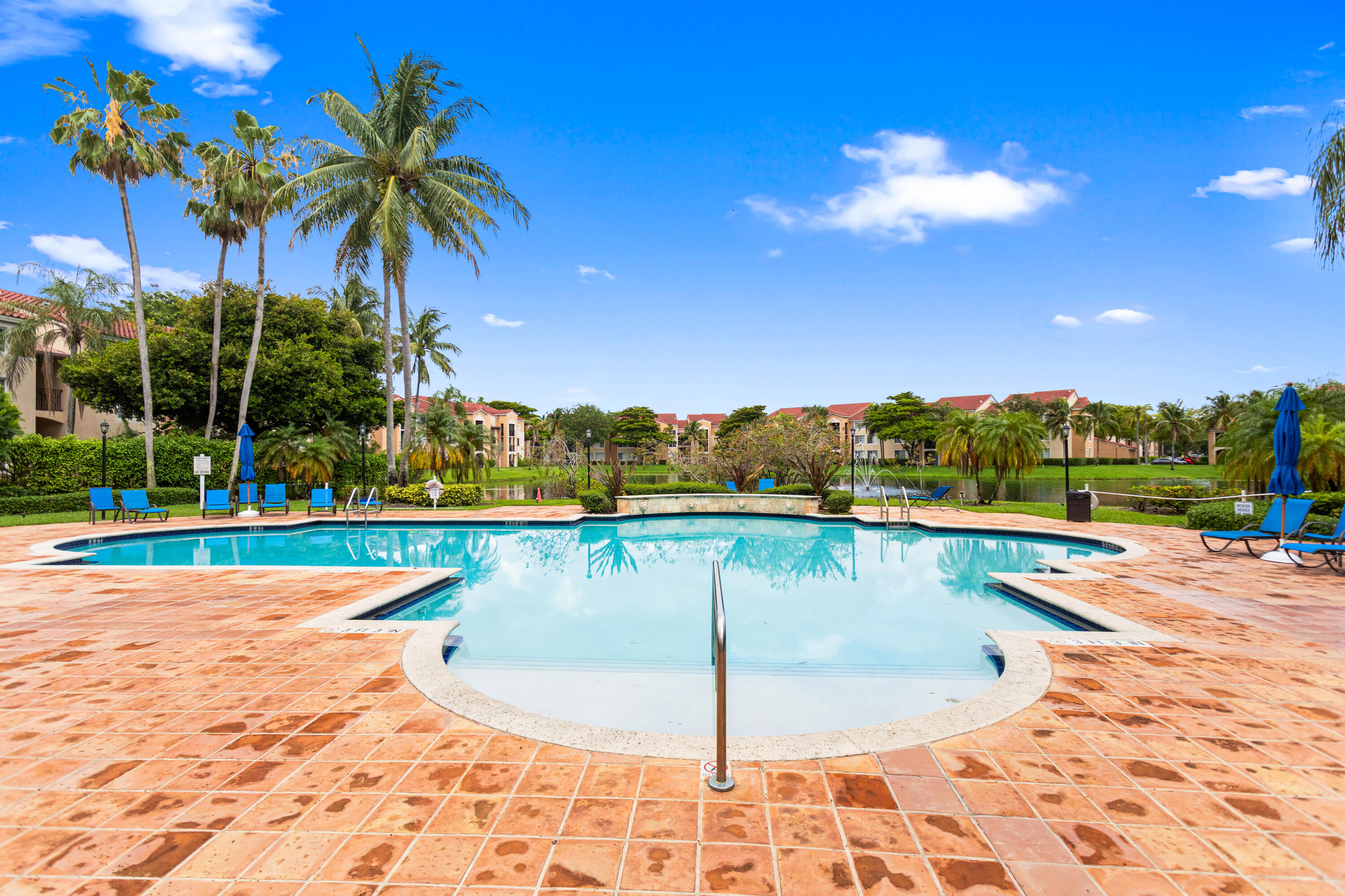 2113 Renaissance Boulevard, Unit 306 Miramar, FL 33025 - Photo 50 of 59 a view of a swimming pool and an outdoor space
