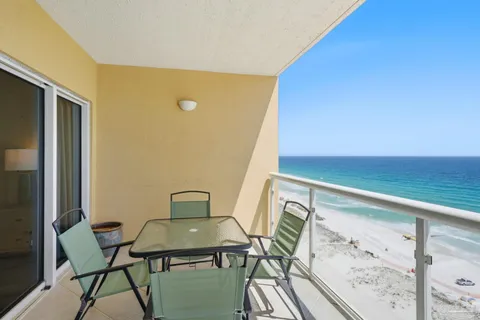 a view of chair and table in the balcony