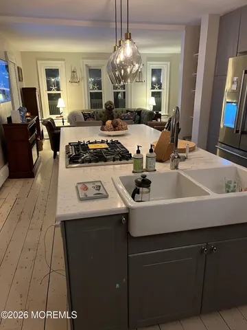 a view of living room with furniture and a large window