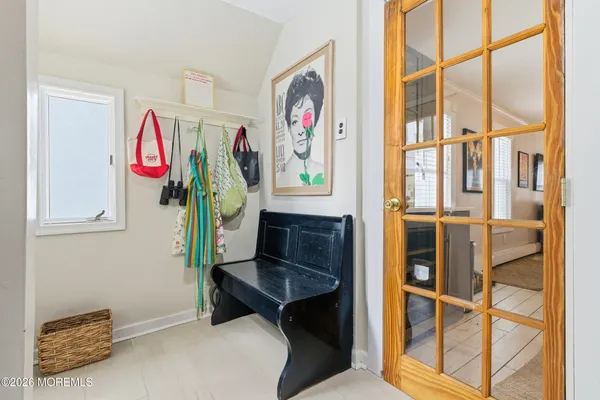 a bedroom with a bed and a lamp