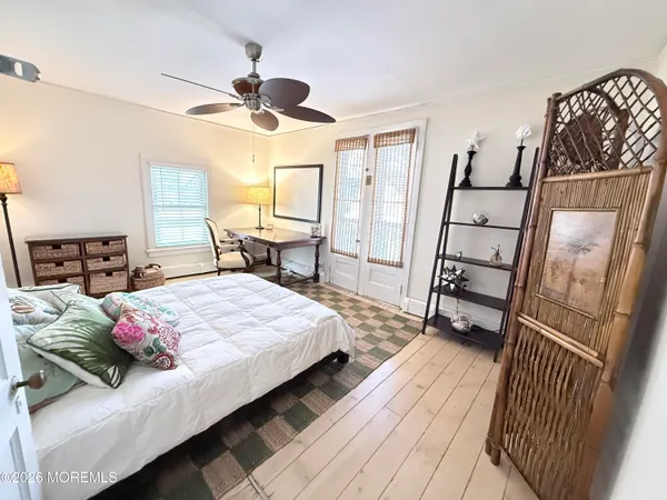 a view of a swimming pool with seating area