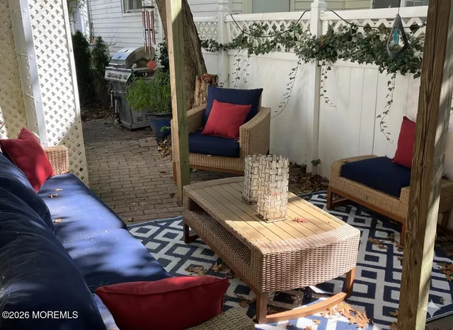 a view of a chairs and tables in patio