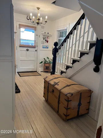 a bedroom with bed and window