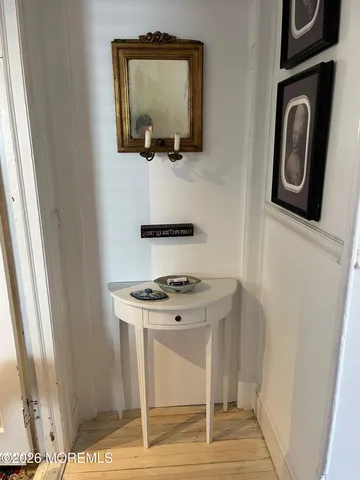 a hallway with washer and dryer