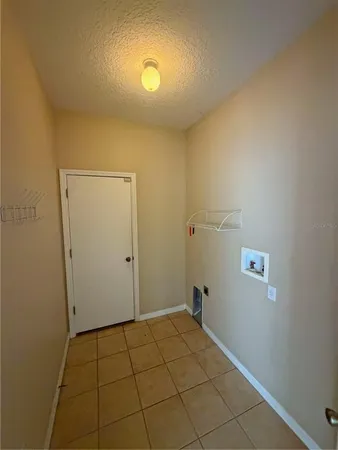 a view of a livingroom with bathroom
