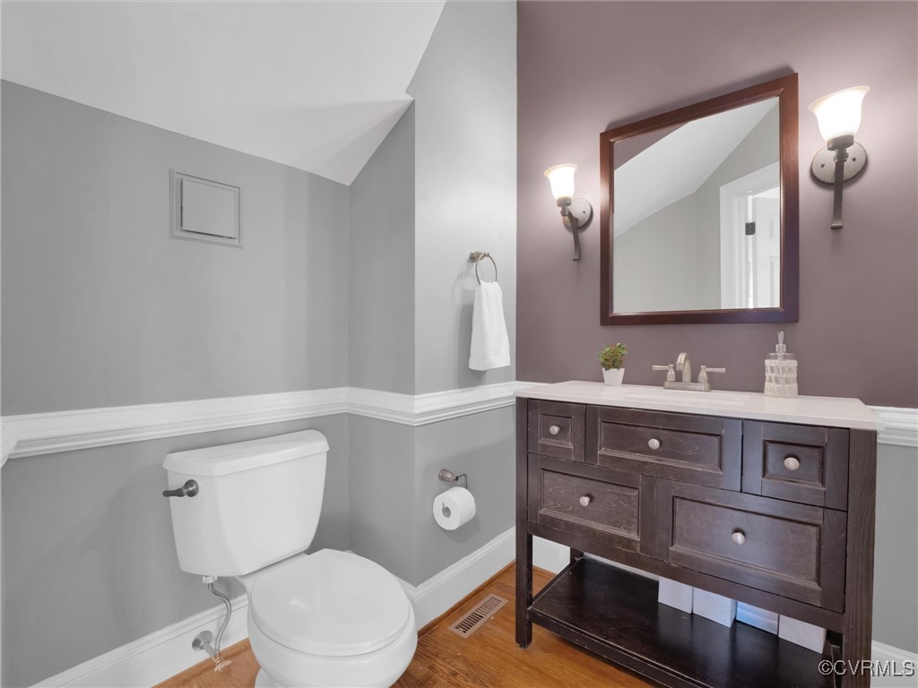 5304 Clipper Cove Road Midlothian, VA 23112 - Photo 18 of 50 a bathroom with a toilet a sink and mirror