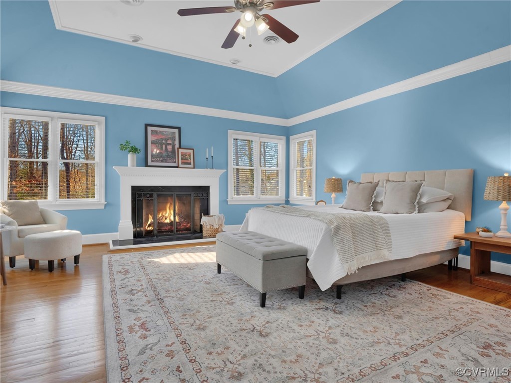 5304 Clipper Cove Road Midlothian, VA 23112 - Photo 8 of 50 a spacious bedroom with a bed and a fireplace