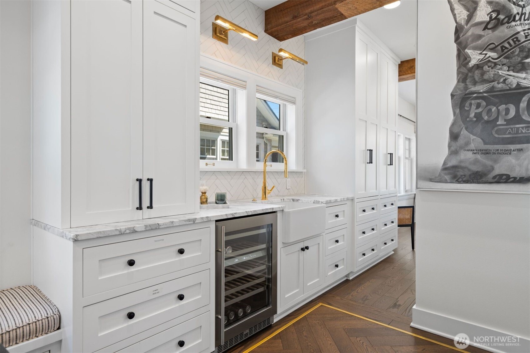 312 Prospect Street Seattle, WA 98109 - Photo 11 of 40 a bathroom with mirror cabinets and window