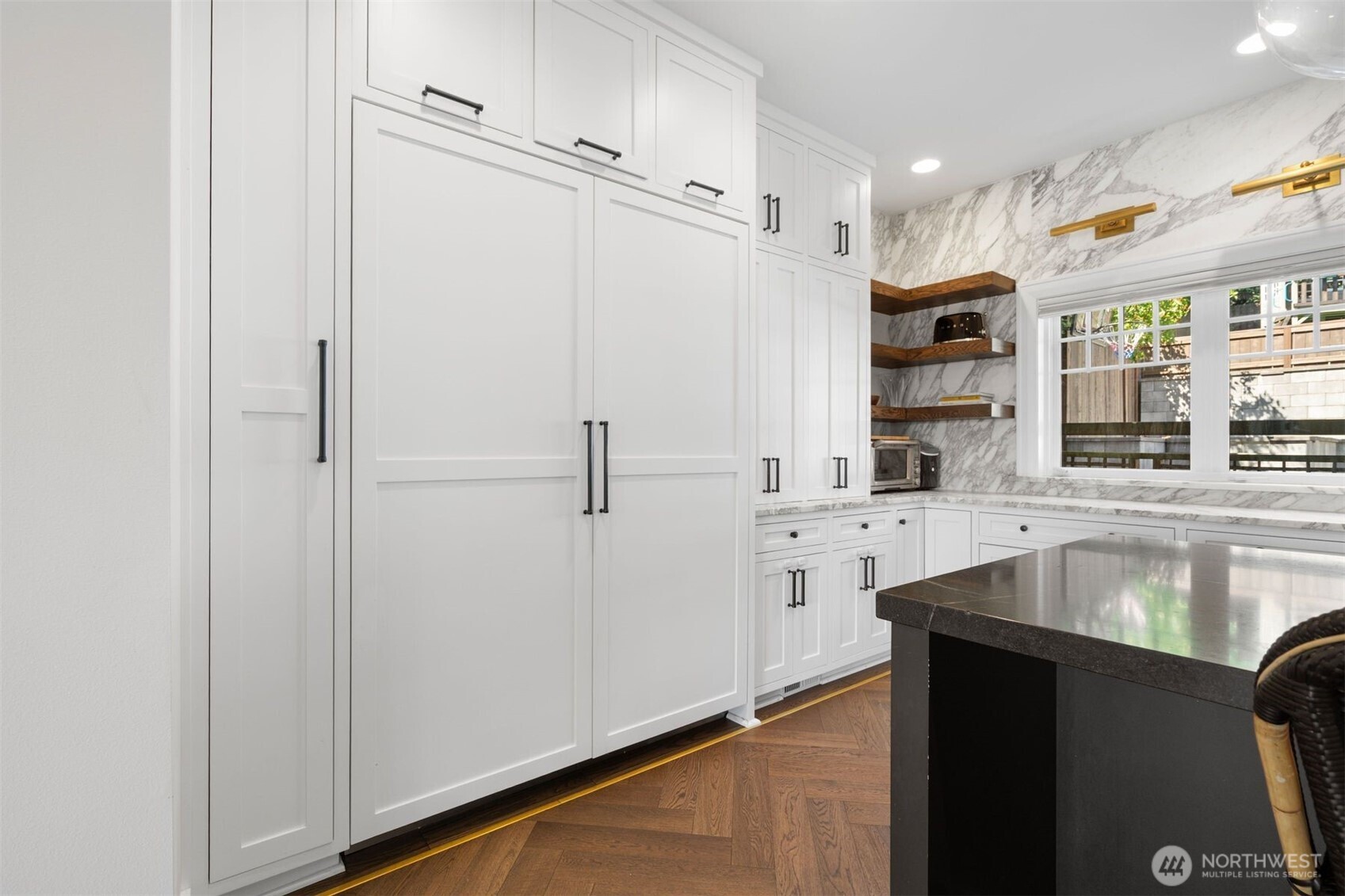 312 Prospect Street Seattle, WA 98109 - Photo 16 of 40 a kitchen with stainless steel appliances a refrigerator and a sink