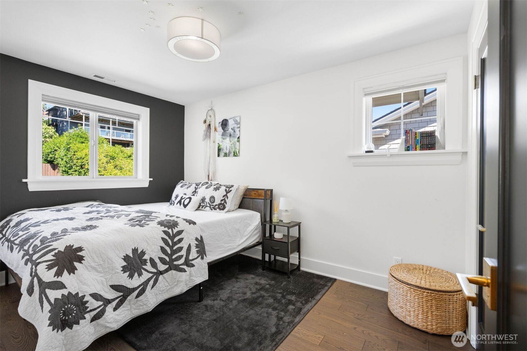 312 Prospect Street Seattle, WA 98109 - Photo 22 of 40 a bedroom with a bed and window