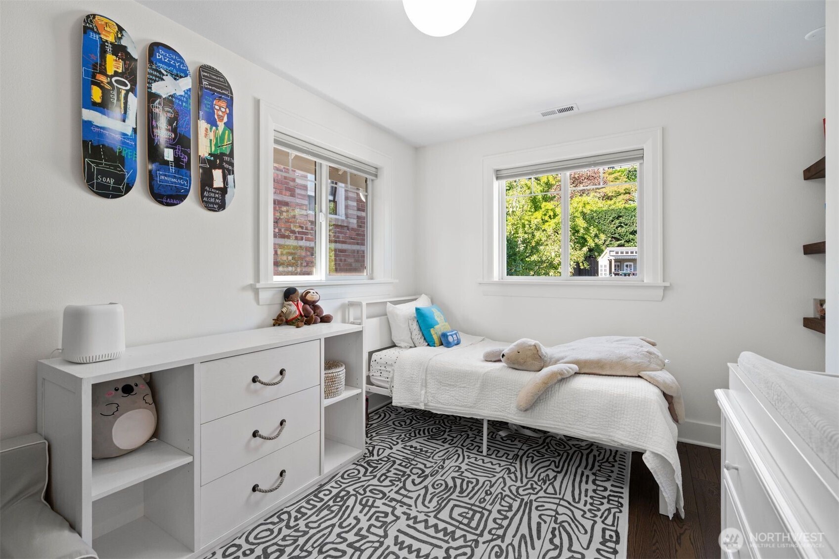 312 Prospect Street Seattle, WA 98109 - Photo 23 of 40 a bedroom with a bed and a window