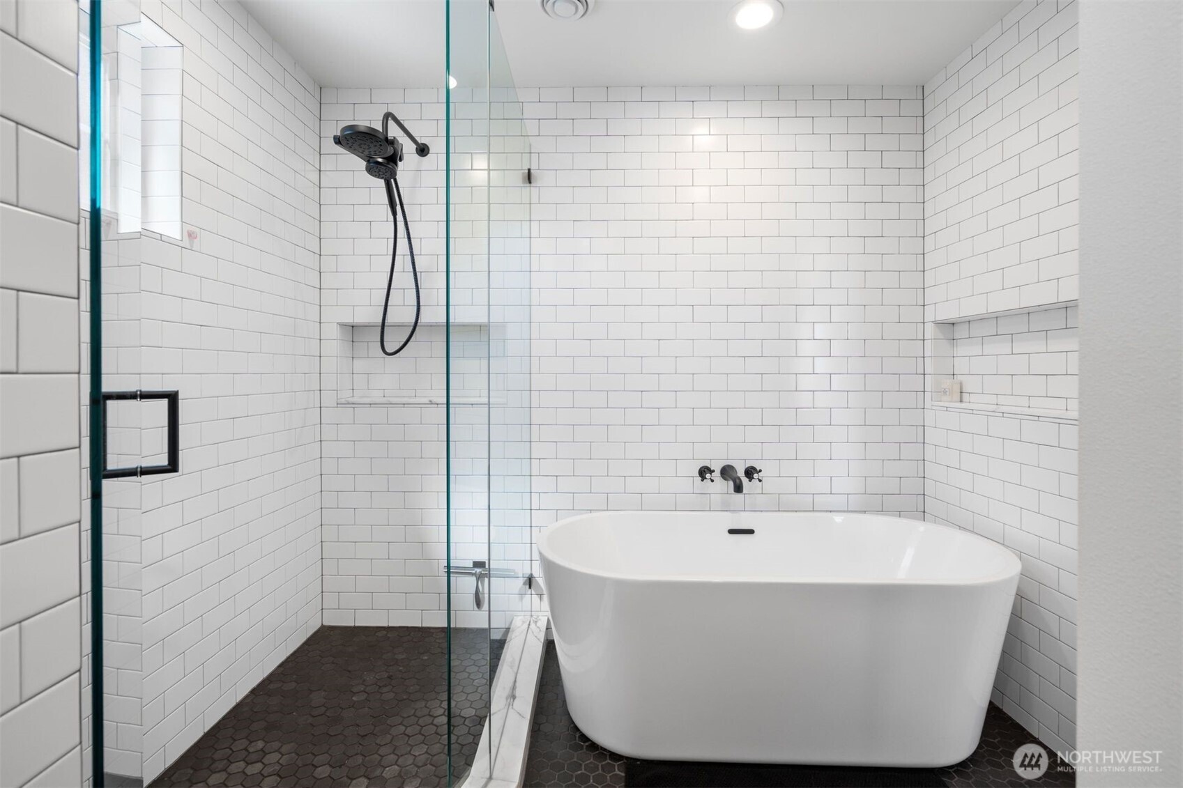 312 Prospect Street Seattle, WA 98109 - Photo 29 of 40 a bathroom with a bathtub and shower