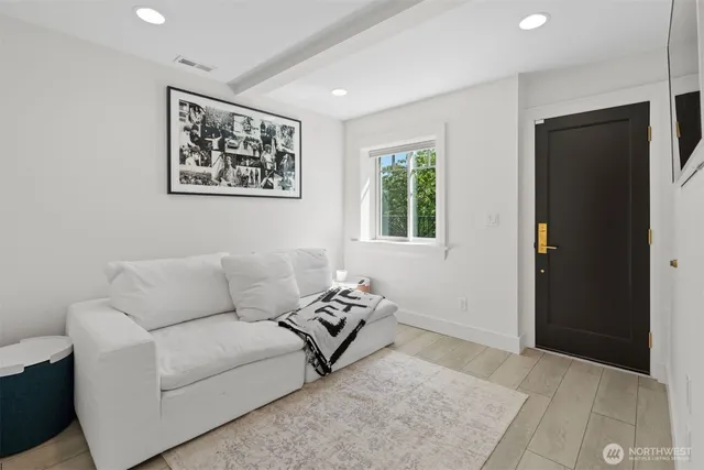 a view of a hardwood & utility room