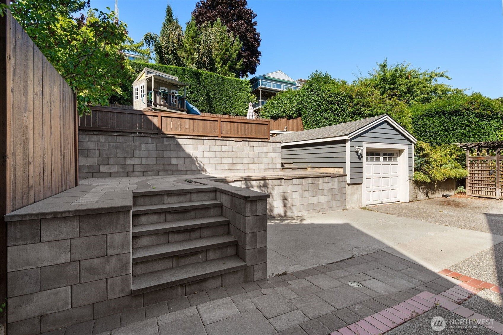 312 Prospect Street Seattle, WA 98109 - Photo 38 of 40 a view of a house with a yard