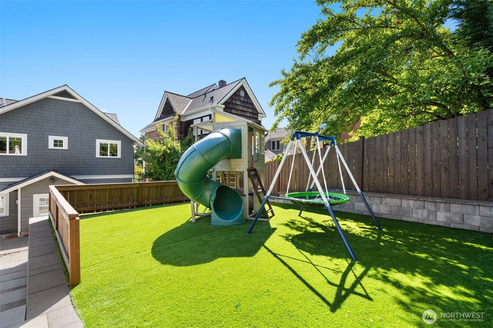 312 Prospect Street Seattle, WA 98109 - Photo 39 of 40 a house view with a swimming pool