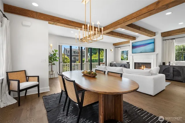 a view of a dining room with furniture window and outside view