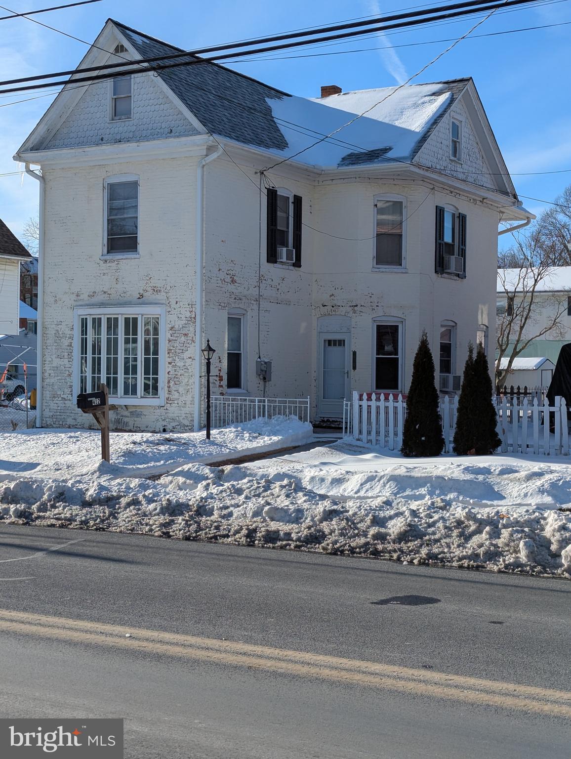 412 South Potomac Street Waynesboro, PA 17268 - Photo 1 of 46 a front view of a house with a yard