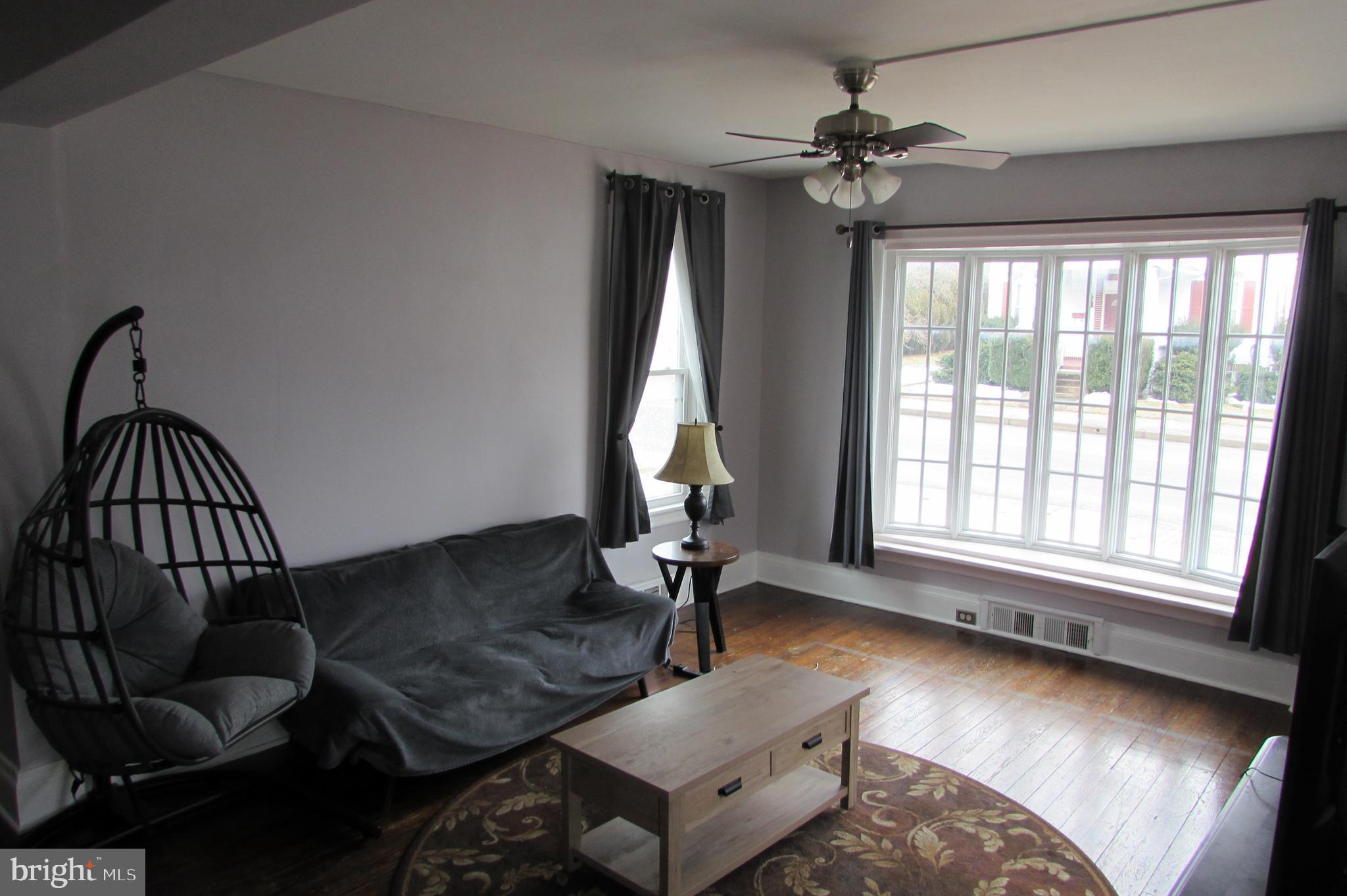 412 South Potomac Street Waynesboro, PA 17268 - Photo 11 of 46 a living room with furniture and a window