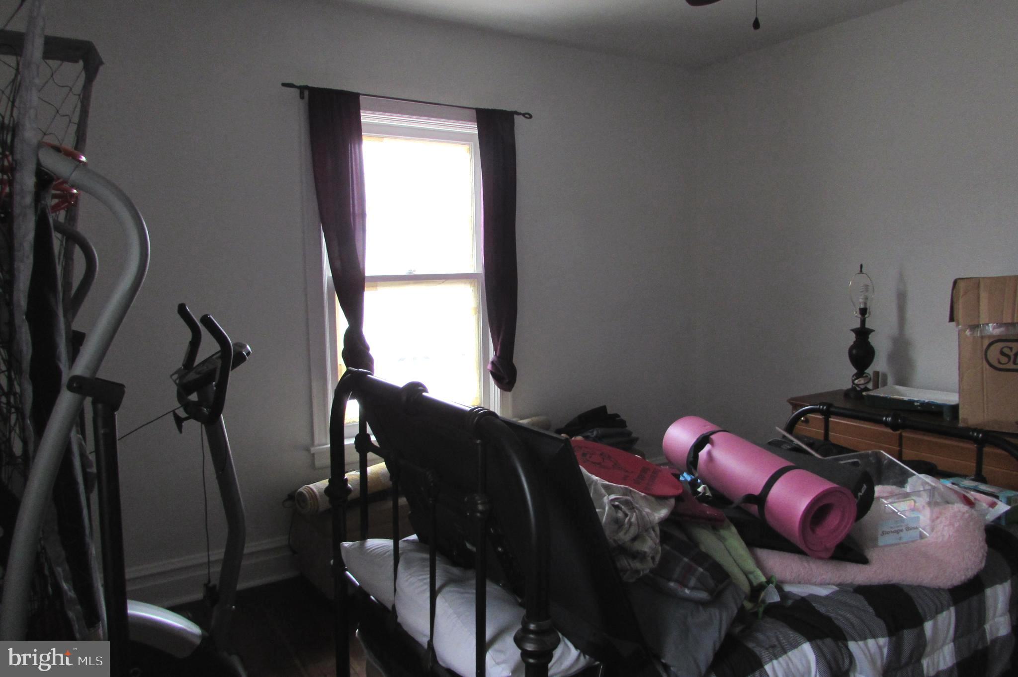 412 South Potomac Street Waynesboro, PA 17268 - Photo 30 of 46 a view of a room with furniture and wooden floor