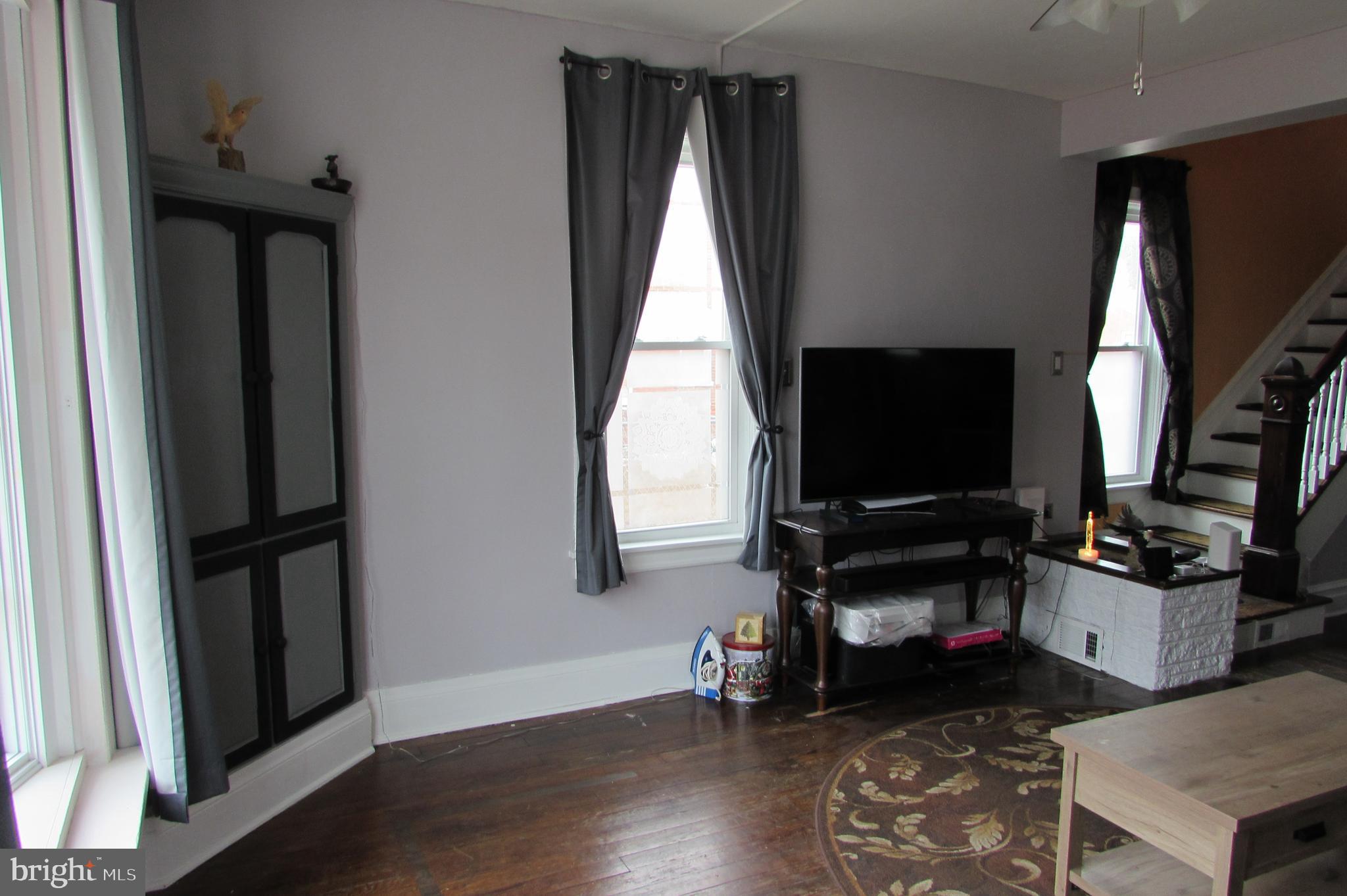 412 South Potomac Street Waynesboro, PA 17268 - Photo 9 of 46 a living room with furniture and a flat screen tv