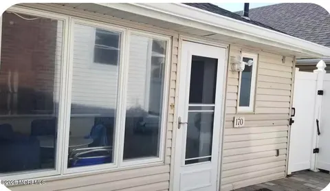 a view of front door and porch