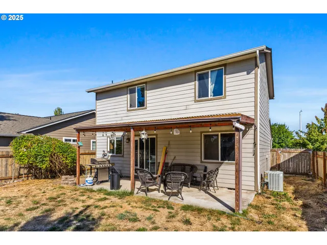 a backyard of a house with seating space