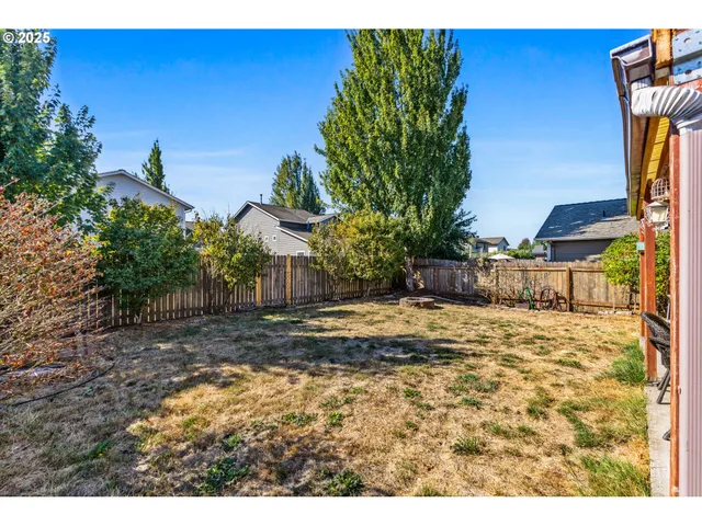 a bathroom with a sink vanity mirror and toilet