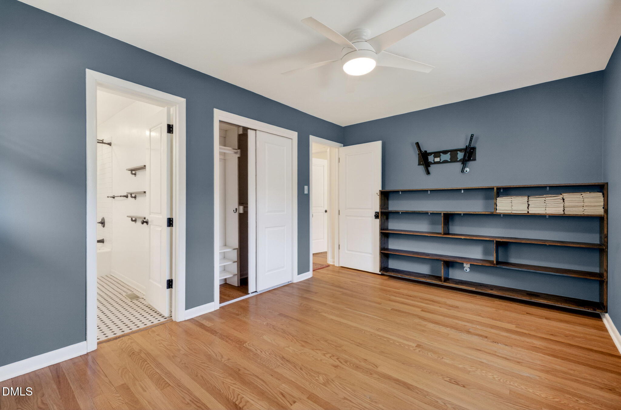 1224 Pineview Drive Raleigh, NC 27606 - Photo 20 of 45 a view of a bedroom with closet and cabinet