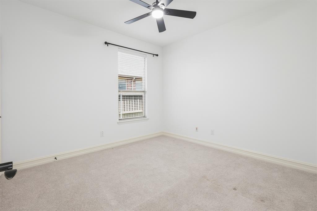1995 Verde Court Allen, TX 75013 - Photo 10 of 30 Bedroom with a ceiling fan and light fixture, light-colored carpeting, a window with blinds, and white baseboards