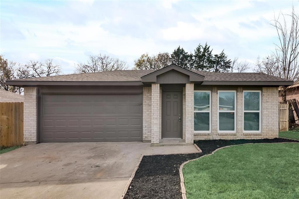 9227 Crimnson Court Dallas, TX 75217 - Photo 1 of 9 Single story home with brick siding, roof with shingles, driveway, and an attached garage