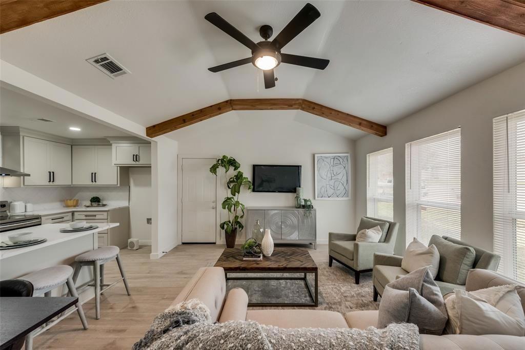 9227 Crimnson Court Dallas, TX 75217 - Photo 2 of 9 Living room featuring light wood-style floors and a ceiling fan