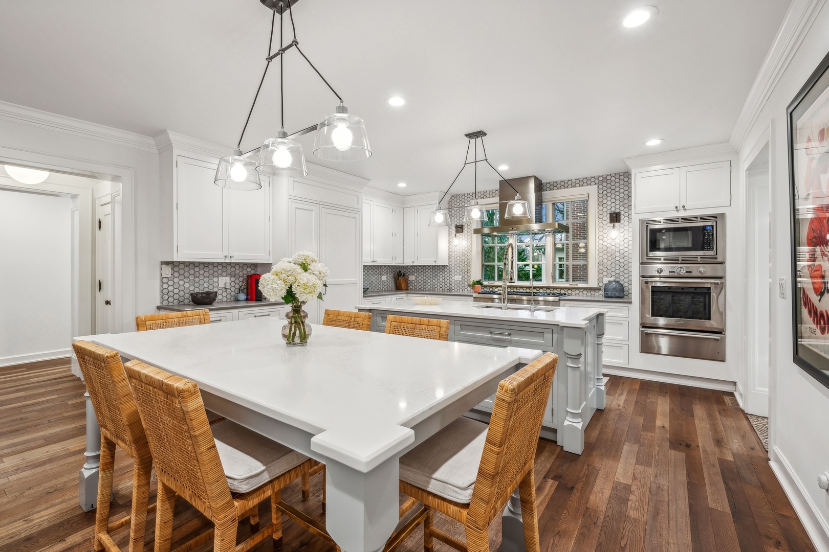 78 Robsart Road Kenilworth, IL 60043 - Photo 14 of 44 a large kitchen with a table and chairs in it