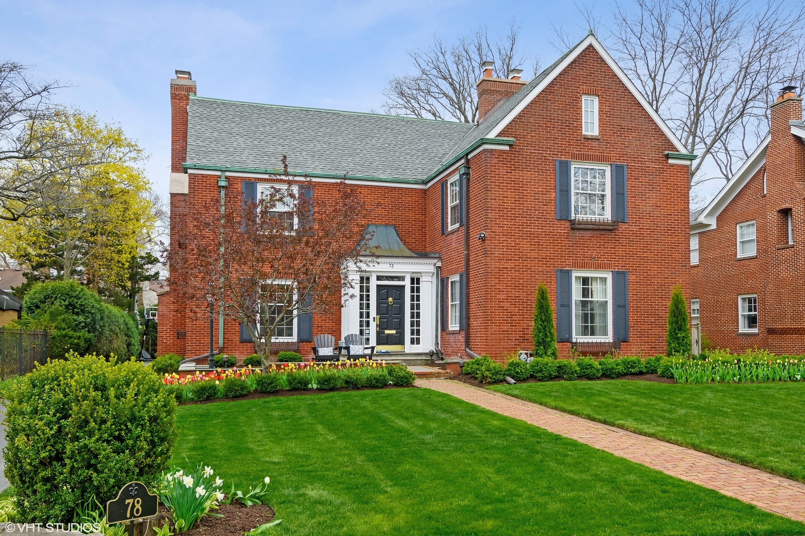 78 Robsart Road Kenilworth, IL 60043 - Photo 2 of 44 front view of house with a yard