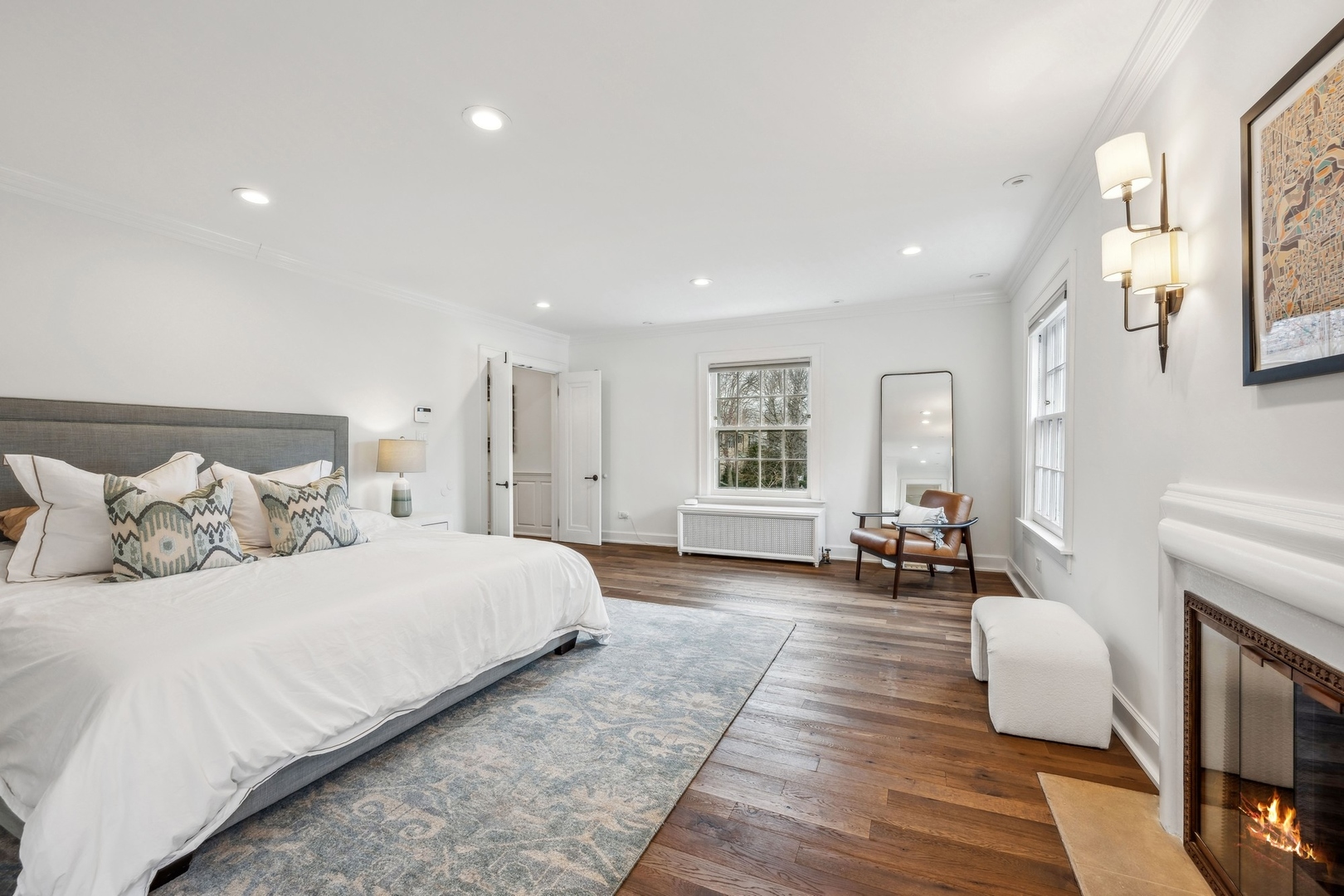 78 Robsart Road Kenilworth, IL 60043 - Photo 27 of 44 a bedroom with a bed and wooden floor