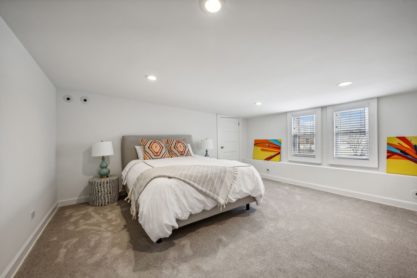 78 Robsart Road Kenilworth, IL 60043 - Photo 34 of 44 a spacious bedroom with a bed and window