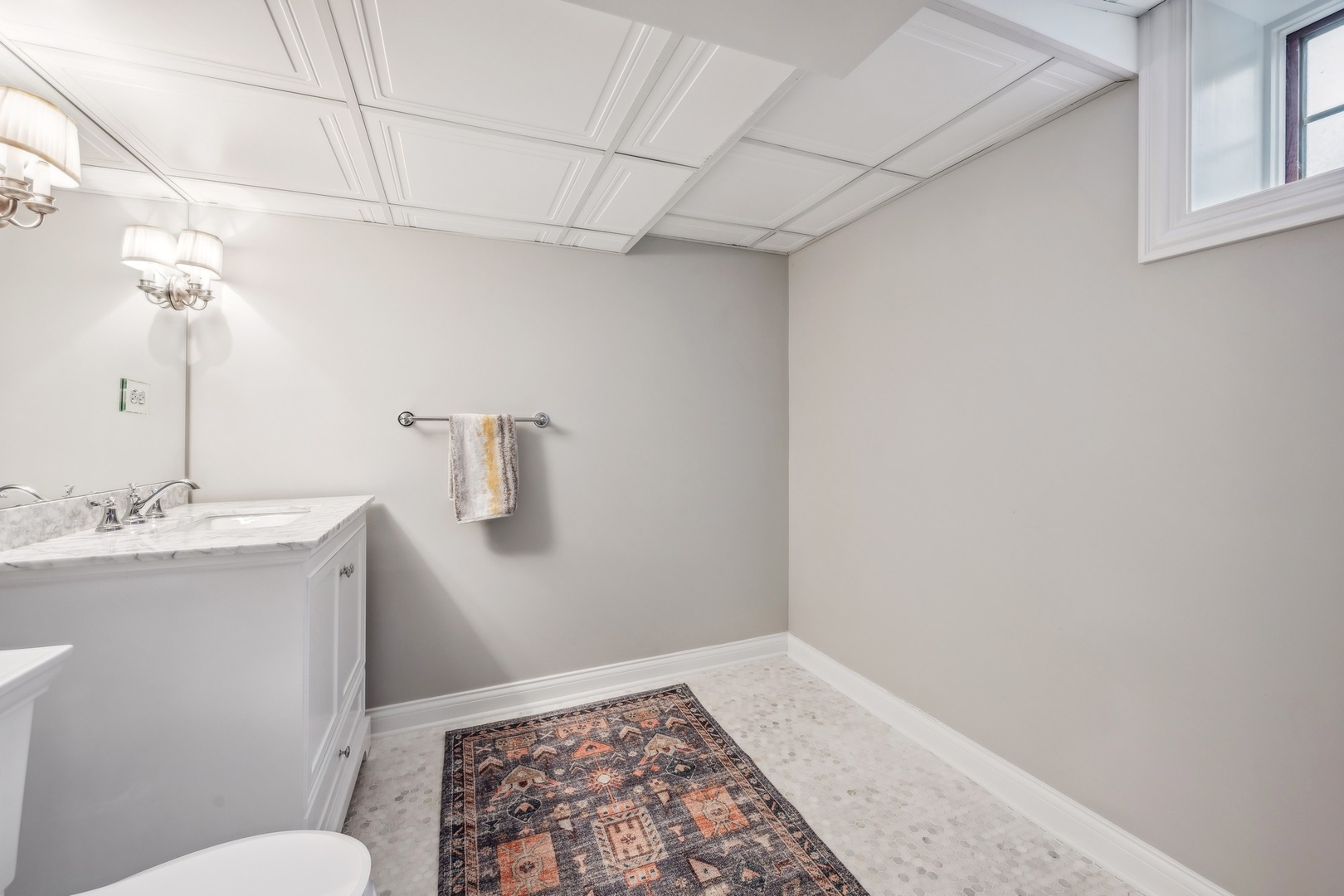 78 Robsart Road Kenilworth, IL 60043 - Photo 40 of 44 a bathroom with a sink a toilet and vanity