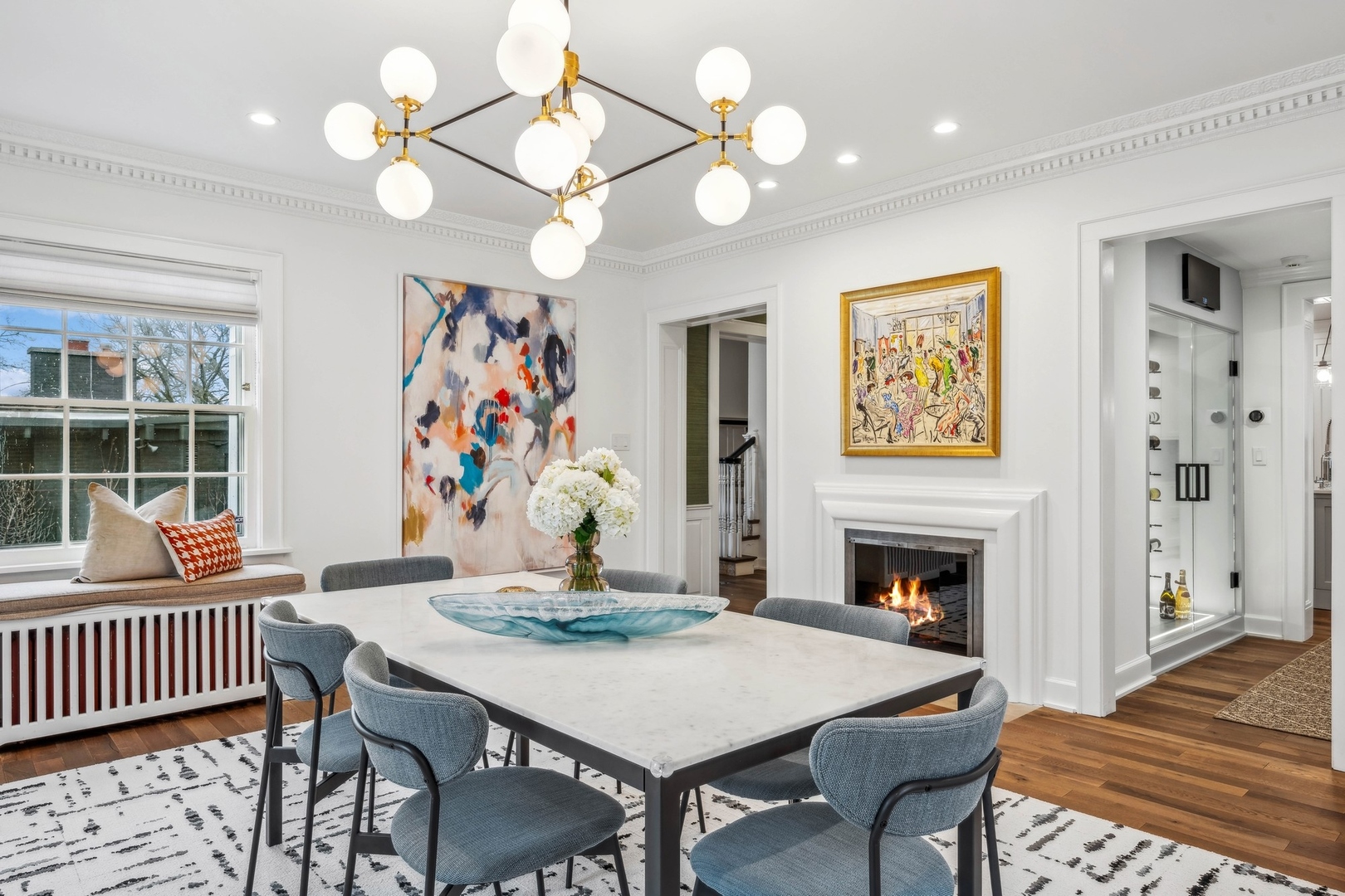 78 Robsart Road Kenilworth, IL 60043 - Photo 5 of 44 a view of a dining room with furniture a chandelier and wooden floor