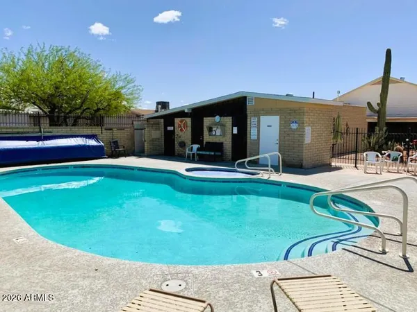 a view of a house with swimming pool