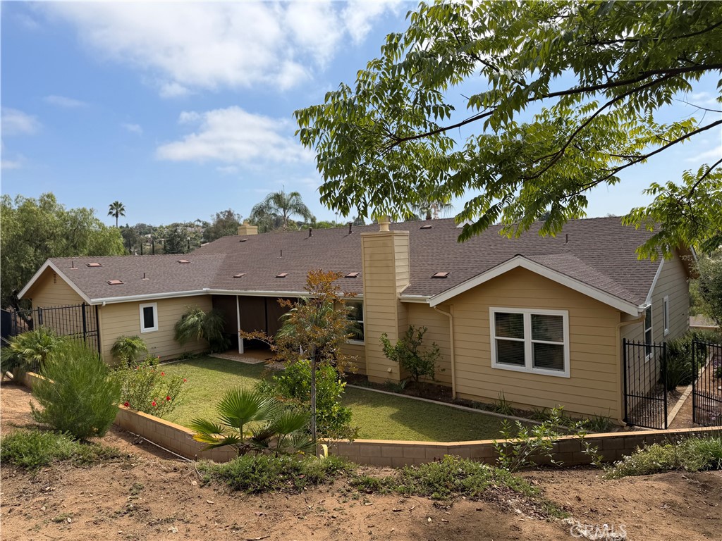 3839 Forbell Place Fallbrook, CA 92028 - Photo 22 of 98 Back patio is part of the roof line and is an ideal outdoor area to relax.